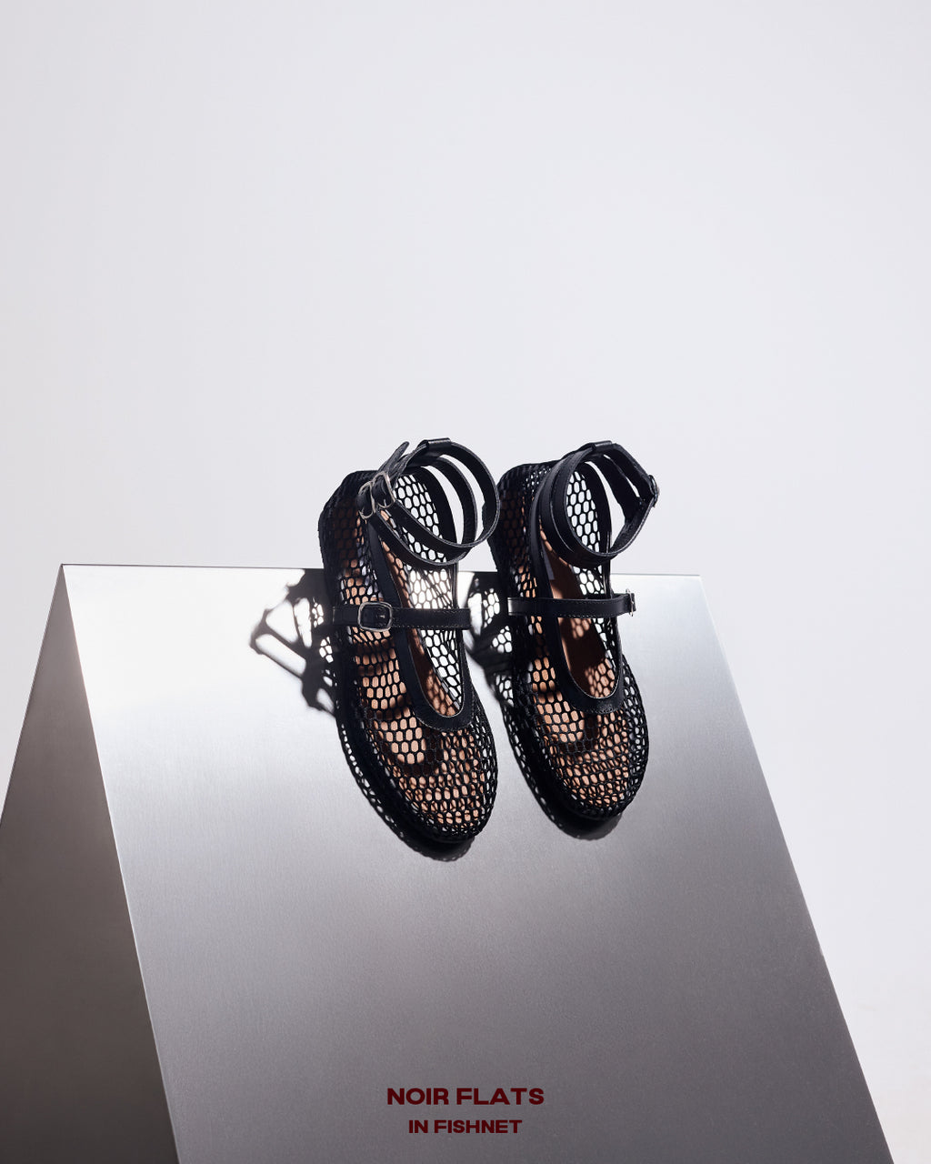 NOIR FLATS IN FISHNET